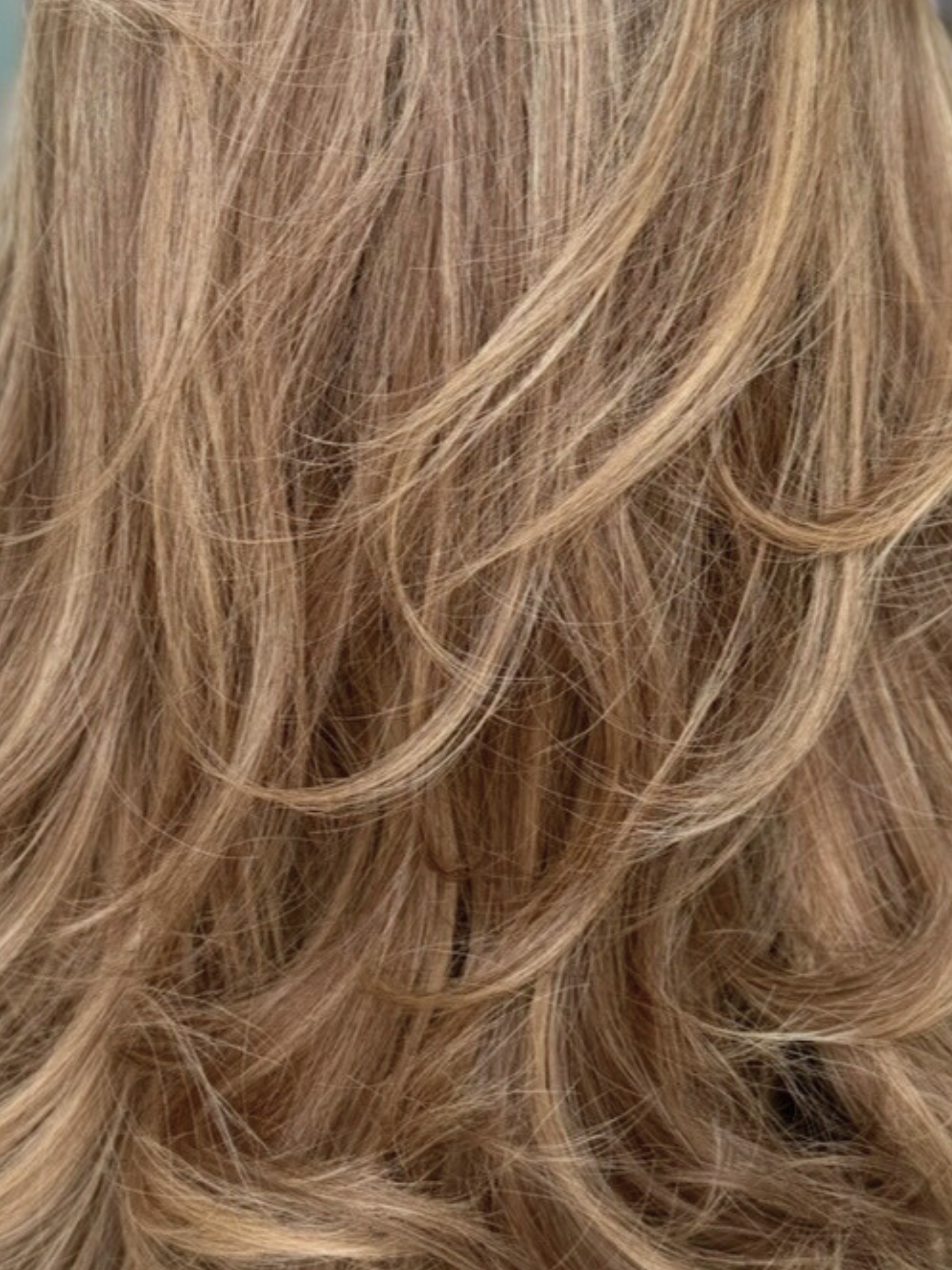 Close-up of wavy blonde hair