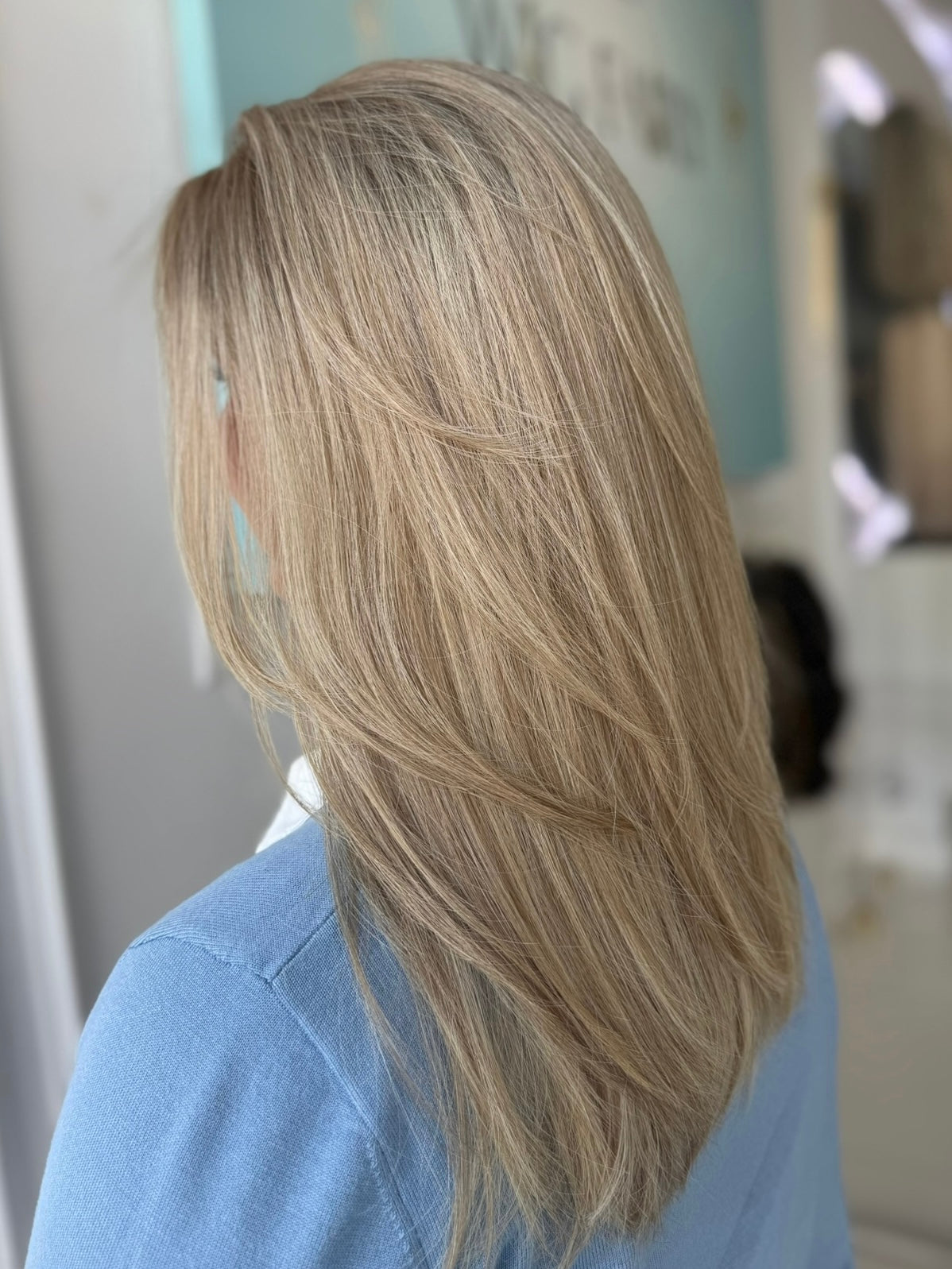 Right side view of Charlotte 20-inch wig in sun-kissed beige blonde, styled by The Wig Fairy Beverly Hills team.