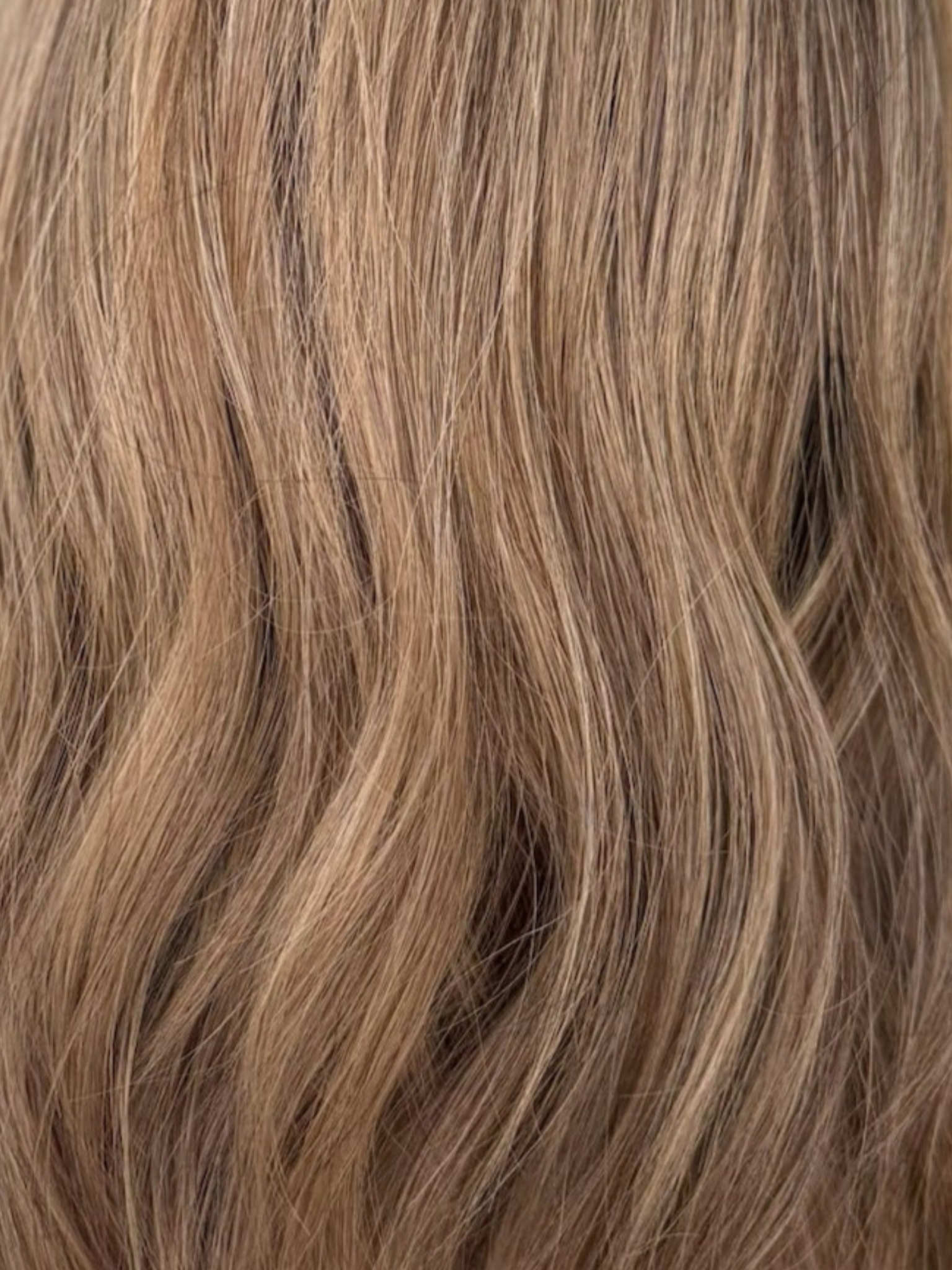 Close-up of wavy brown hair