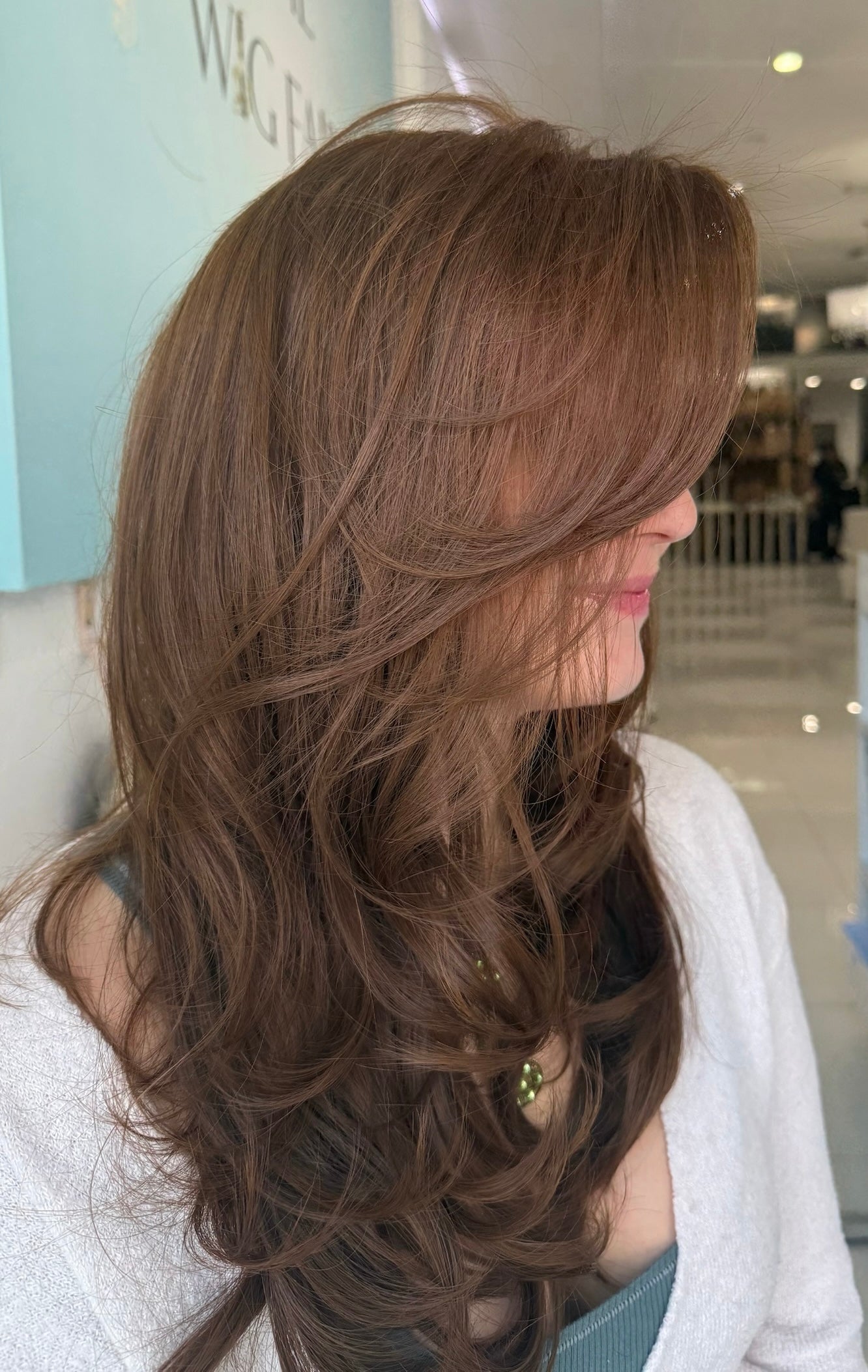 Autumn 24-inch lace top wig in ginger brown, featuring voluminous waves and flawless lace for a natural, chic finish.