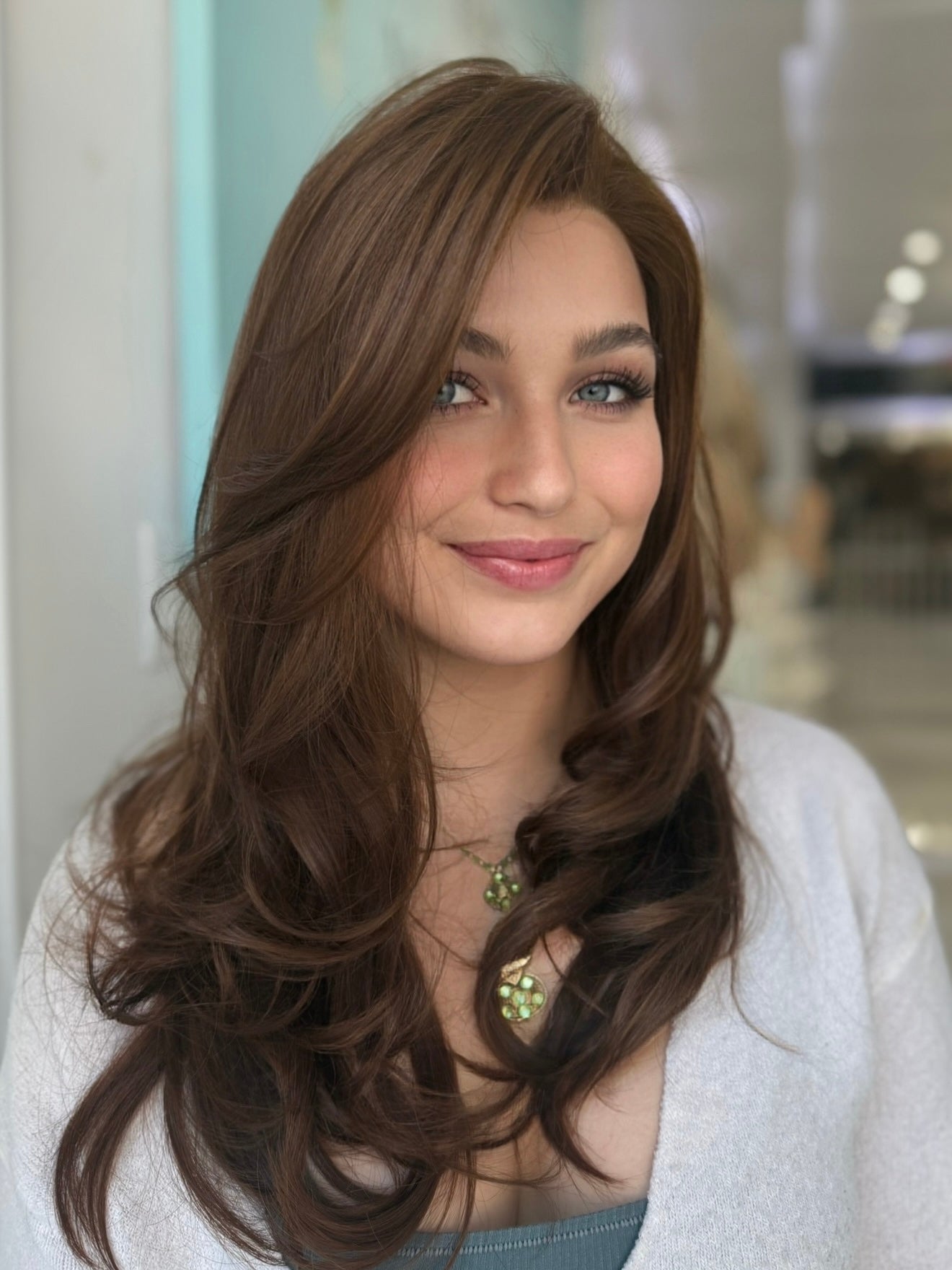 Autumn lace top wig, 24 inches in ginger brown, styled in soft waves for a flawless, natural look with pre-cut lace for a seamless finish.