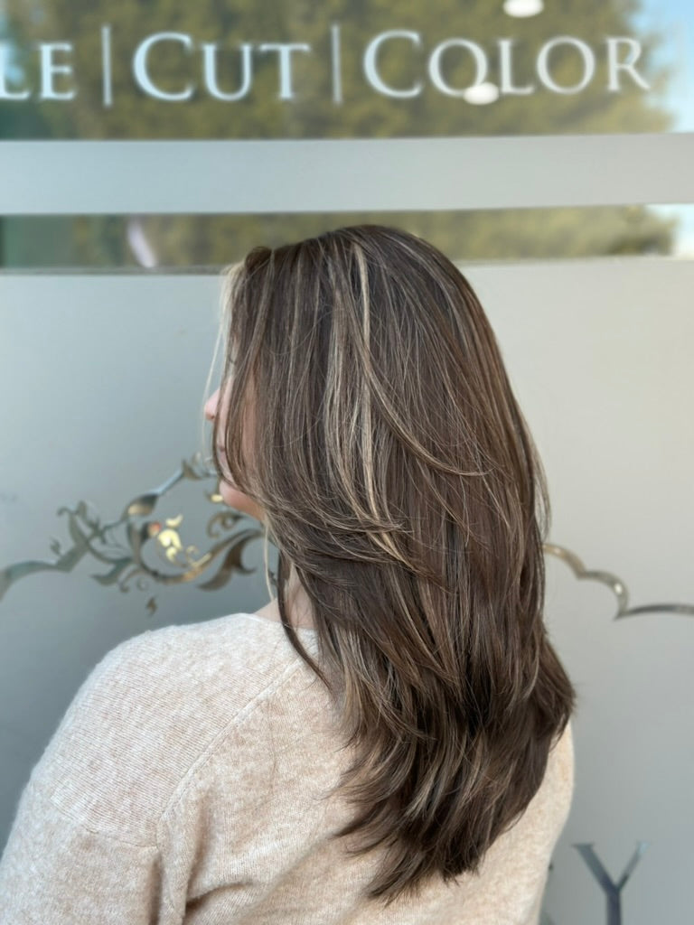 Rachel lace top wig, 22 inches in blonde, with pre-cut lace for a flawless, natural look, styled in a sleek, soft-wave bob.
