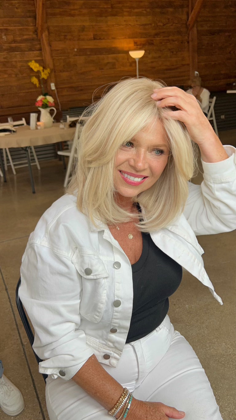 Viral lace top wig, 16 inches in blonde, with pre-cut lace for a flawless, natural appearance, crafted from 100% European hair.