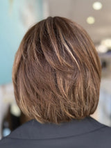 Elegant Hazel 12-inch wig in medium brown with soft blonde highlights, perfect for a natural, yet stylish look.