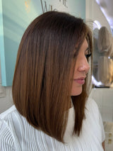 Aria 20-inch lace top wig in dark brown, featuring a smooth, straight style and flawless lace for a natural, polished finish.