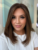 Aria lace top human hair wig, 20 inches in dark brown, with pre-cut lace for a flawless, natural look, styled in a sleek straight cut.
