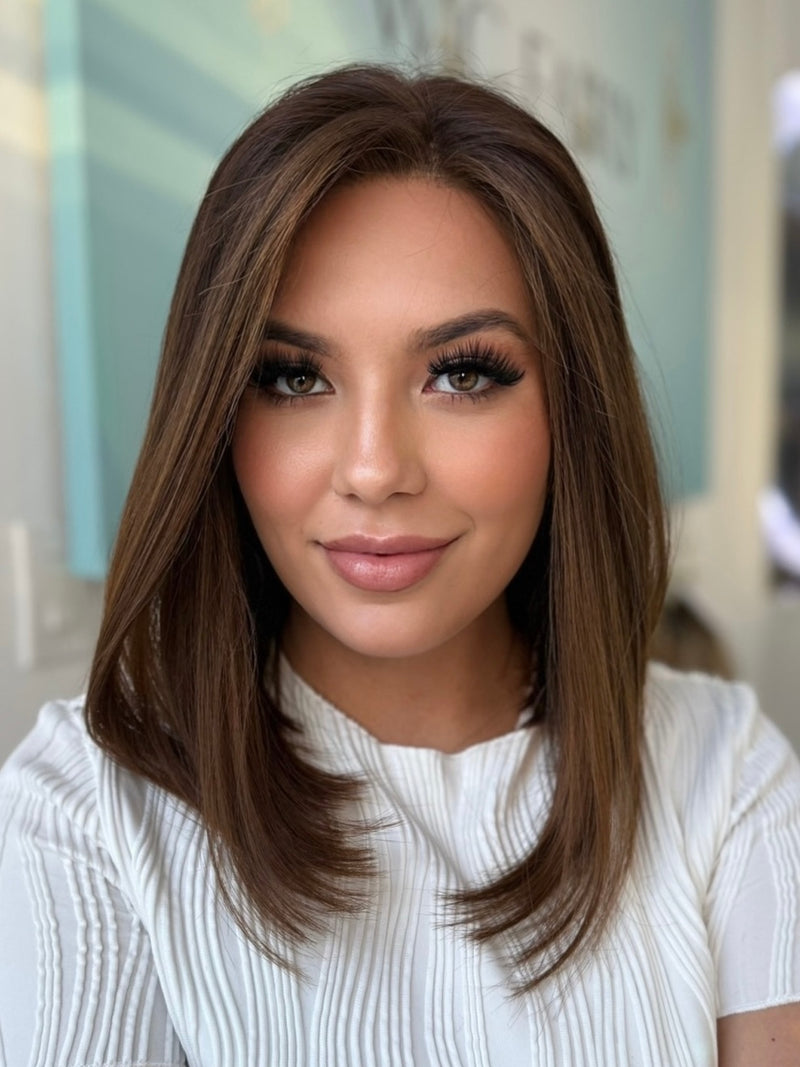 Aria lace top human hair wig, 20 inches in dark brown, with pre-cut lace for a flawless, natural look, styled in a sleek straight cut.
