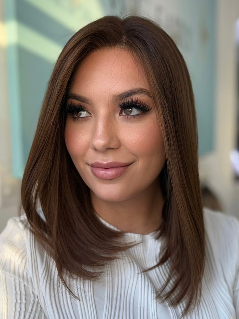 Aria lace top wig, 20 inches in dark brown, styled in a sleek, straight cut for a flawless, natural look with pre-cut lace for easy wear.