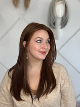 Blaise 24-inch lace top wig in reddish-brown, featuring a smooth, sleek style with flawless lace for a polished, confident finish.