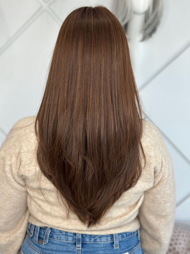 Blaise lace top wig, 24 inches in reddish-brown, styled in sleek, straight layers with pre-cut lace for a flawless, head-turning look.