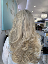  Candice 26-inch lace top wig in blonde, featuring glamorous, voluminous waves for a stunning, natural finish with flawless lace for a seamless look.