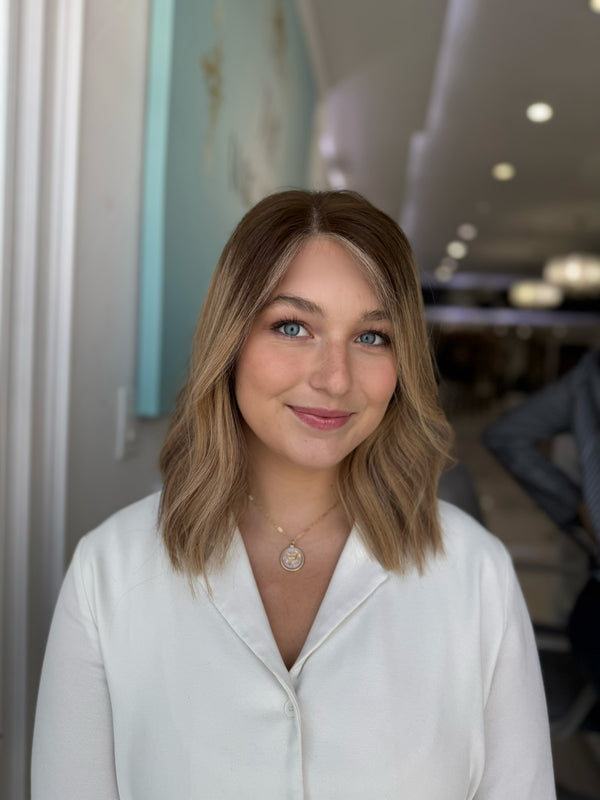 Ombré brunette to blonde wig with beach waves, money piece highlights, and lace front