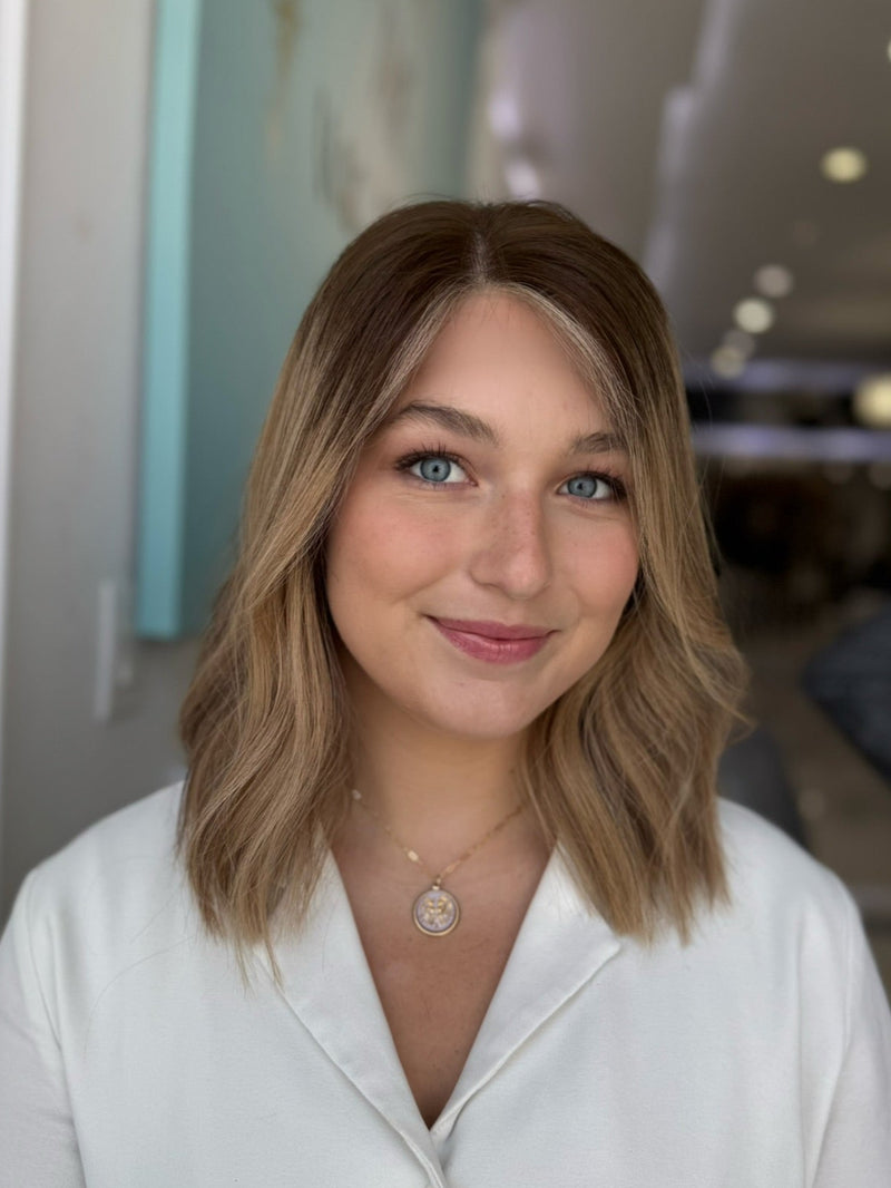 Ombré brunette to blonde wig with beach waves, money piece highlights, and lace front