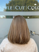 Carrie 18-inch lace top wig in blonde, featuring a lightweight bob style with soft layers and flawless lace for a natural, polished finish.