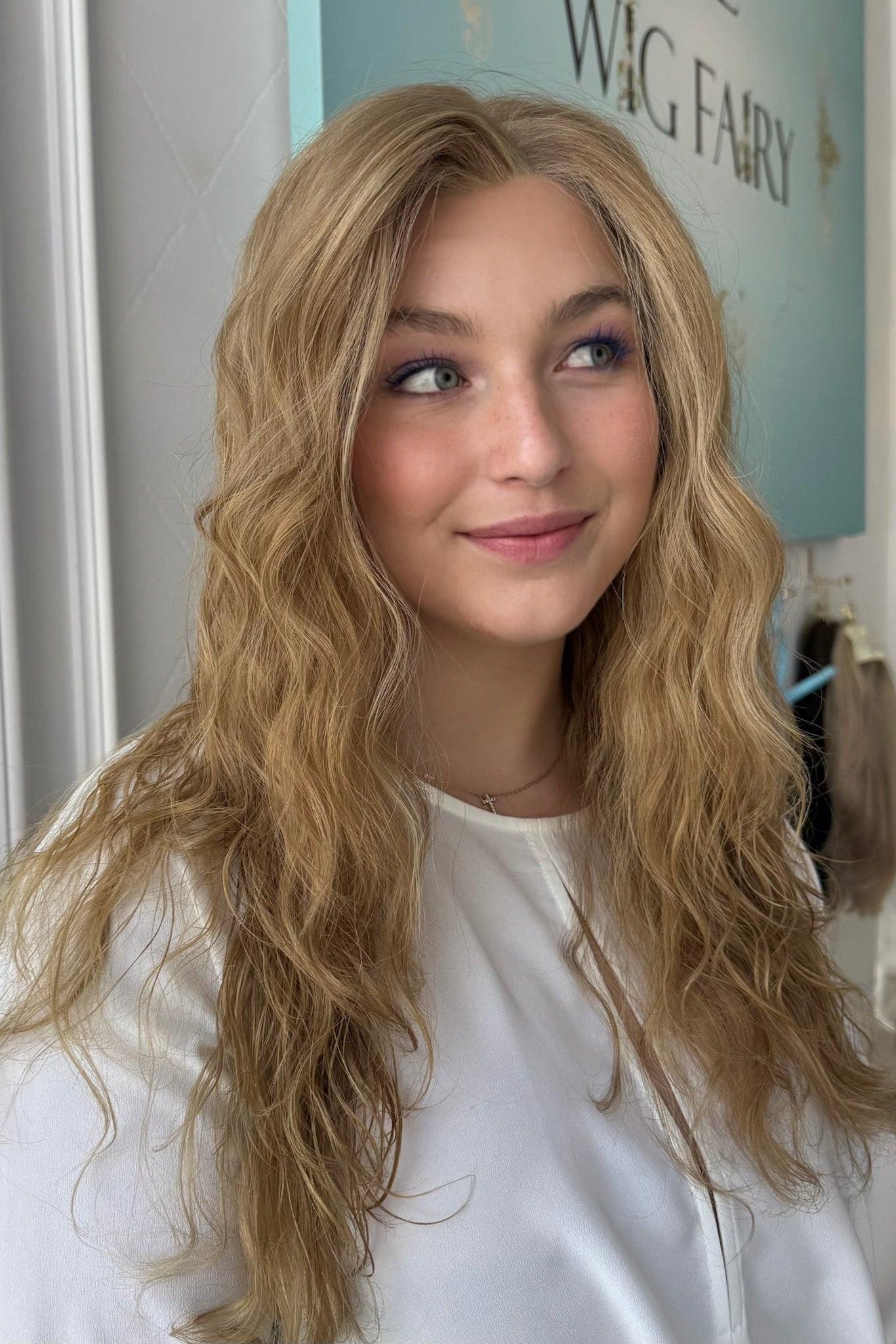 Celine wig with beautiful natural curls, golden blonde, brown shade, and lace front.