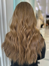 Back view of Erika wig showing 20 inches of natural-looking waves in rich medium ash brown