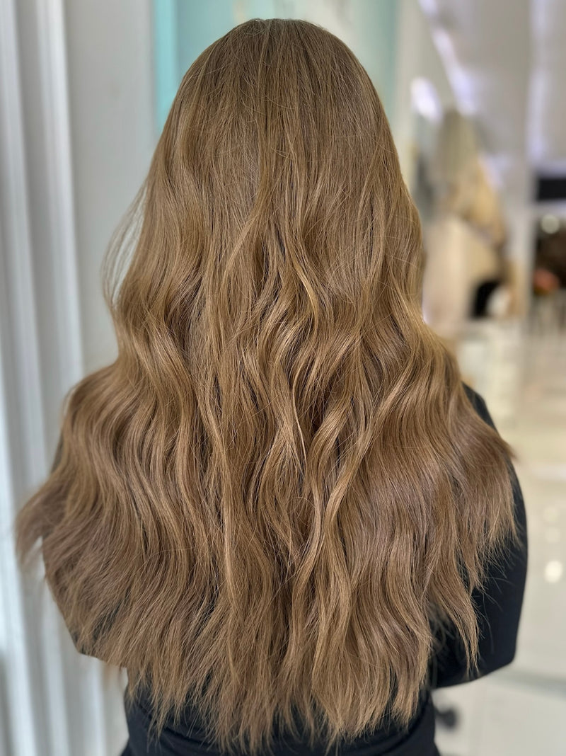 Back view of Erika wig showing 20 inches of natural-looking waves in rich medium ash brown