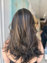 Side view of Gigi pre-cut lace wig showing thickness and flow of European hair