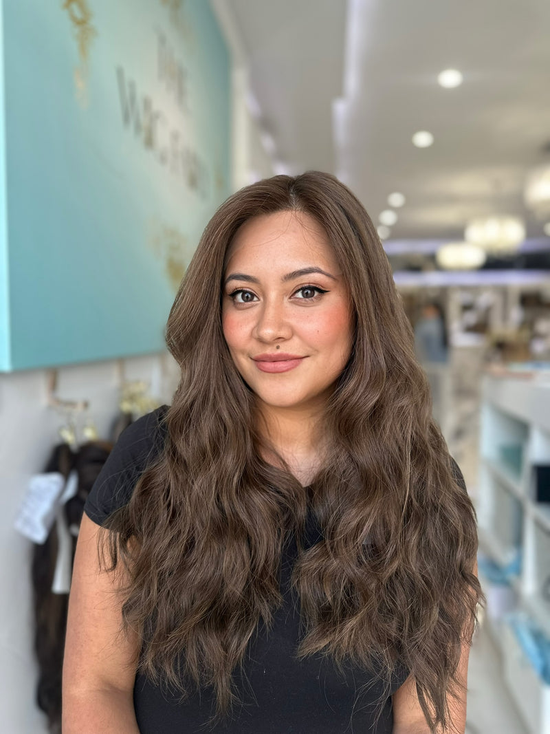 24-inch Brazilian wig in dark brunette blend #6/8 with soft face-framing waves