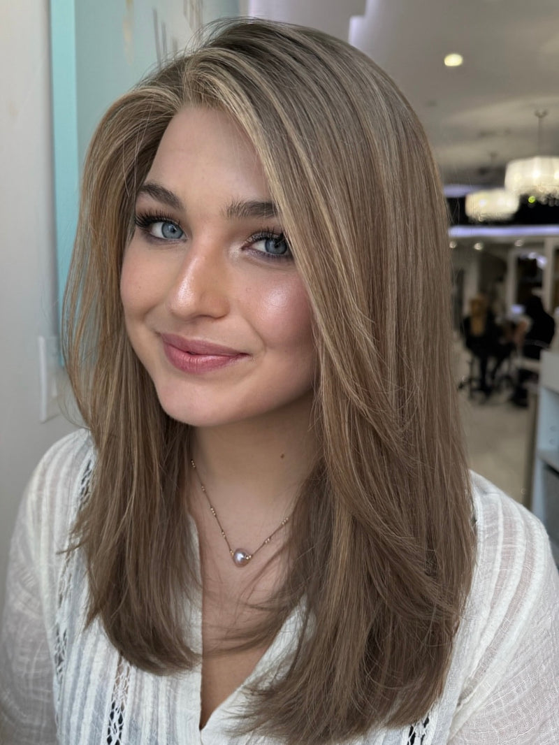 Joann lace top wig, 20 inches with blonde highlights and layered cut, styled for a sleek, natural look with pre-cut lace for seamless wear.