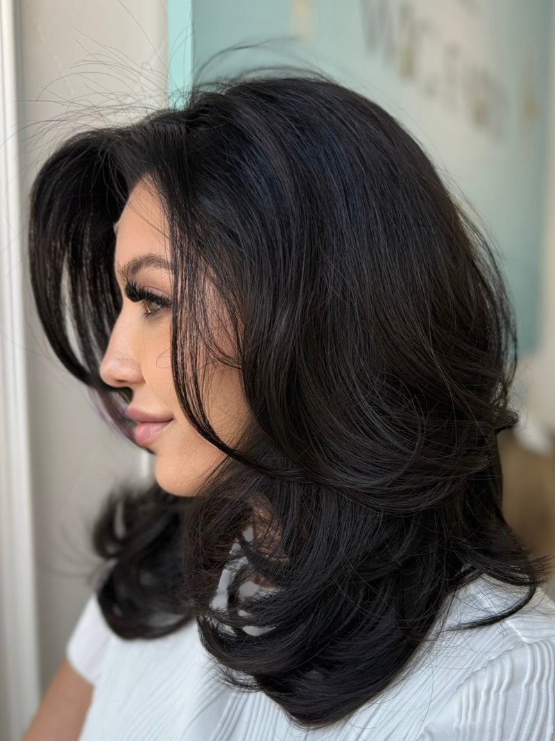 Lily lace top wig, 20 inches in black, with pre-cut lace for a flawless natural look from a side angle.