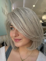Misty 14-inch lace top wig in platinum grey, featuring a chic bob cut and flawless lace for a smooth, natural finish.