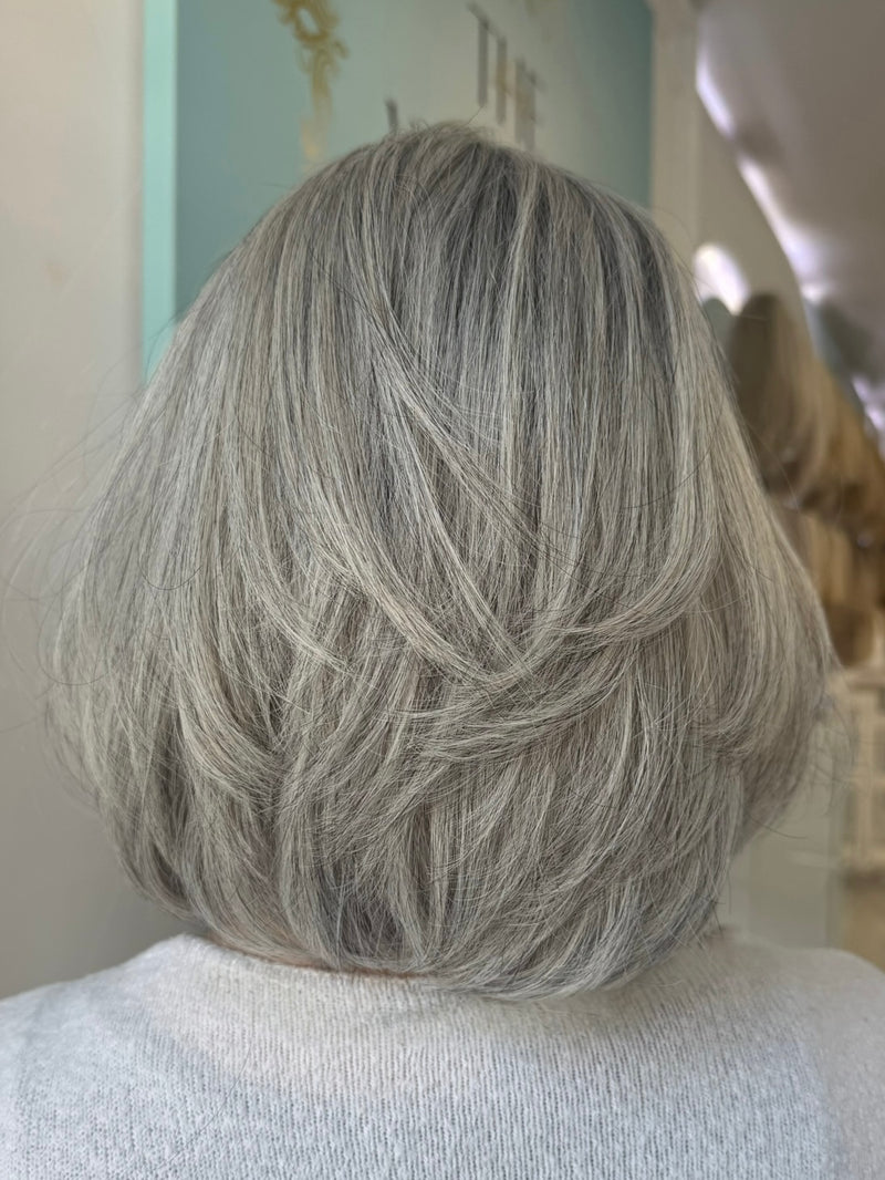 Misty lace top wig, 14 inches in platinum grey, with pre-cut lace for a flawless, natural look, styled in a sleek bob.