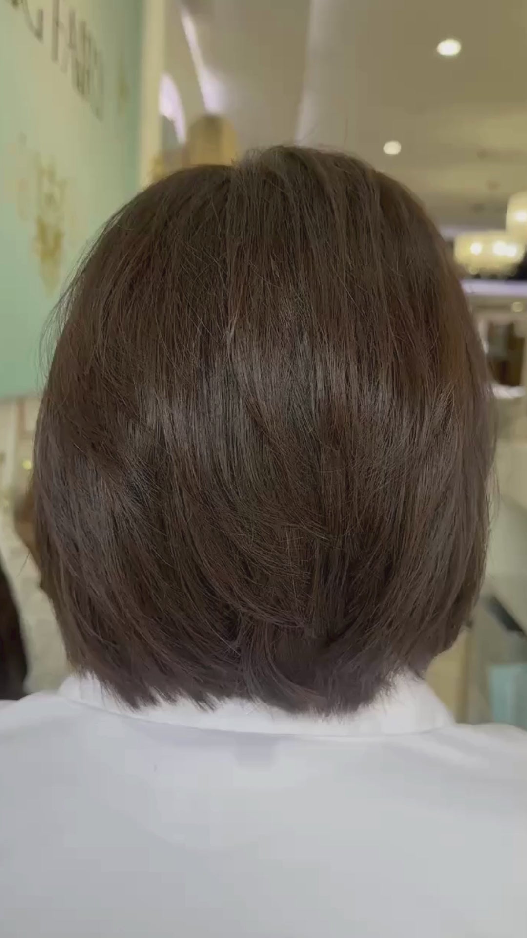 Chic short bob wig with a sleek finish and natural movement, offering a modern, effortless look.