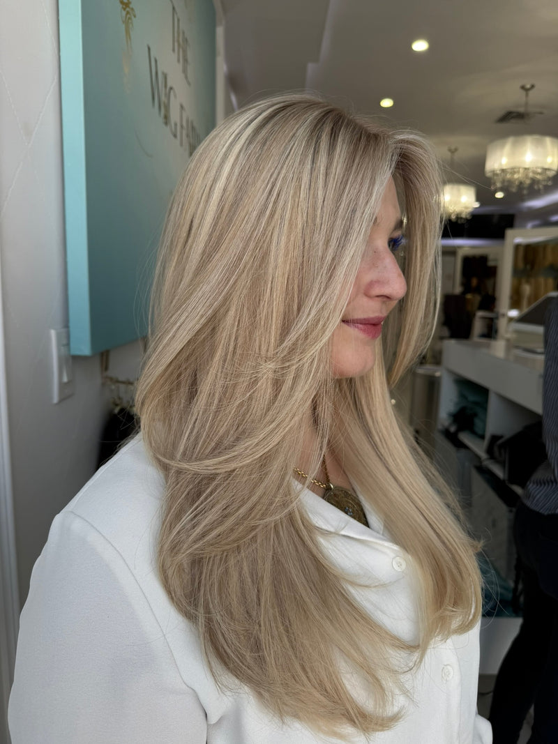 Side view of Roxanne wig with pre-cut lace and flowing European hair