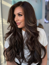 Ruby lace top wig, 30 inches in dark brown with voluminous layers, styled for a full-bodied, flawless look with pre-cut lace for easy wear.