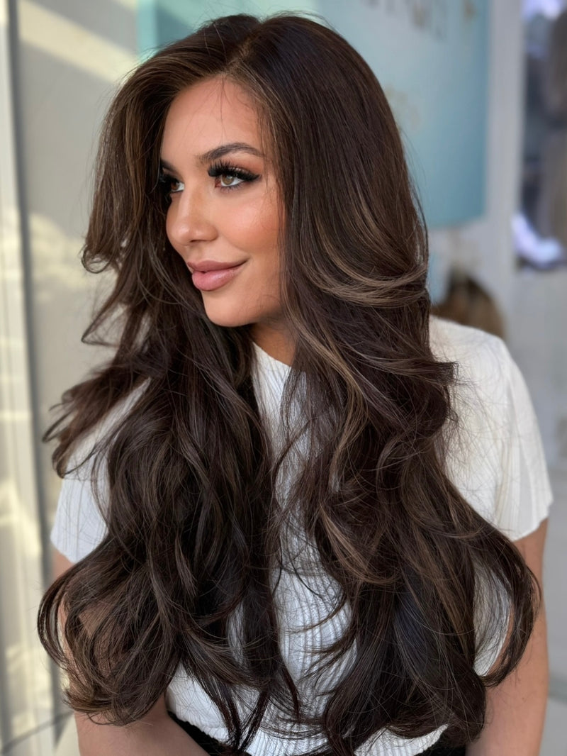 Ruby lace top wig, 30 inches in dark brown with voluminous layers, styled for a full-bodied, flawless look with pre-cut lace for easy wear.