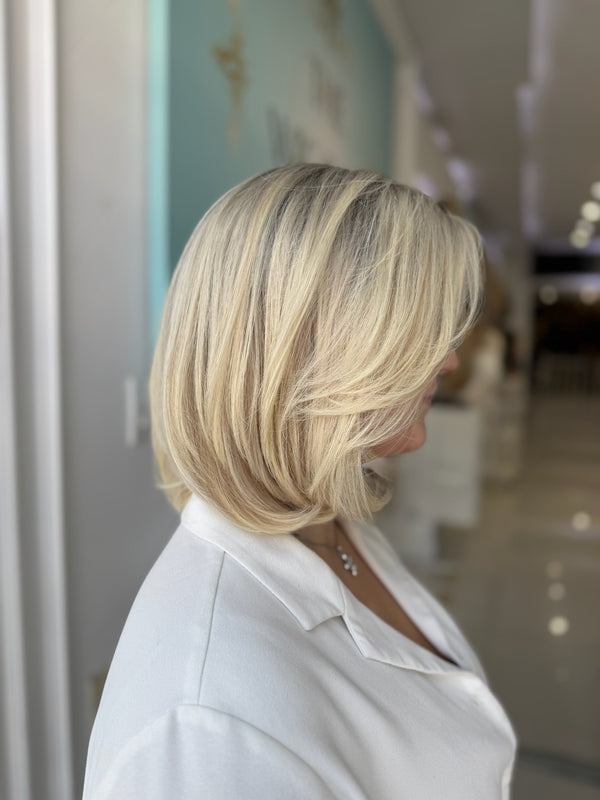 Side profile of Samantha lace top wig in blonde, 16 inches