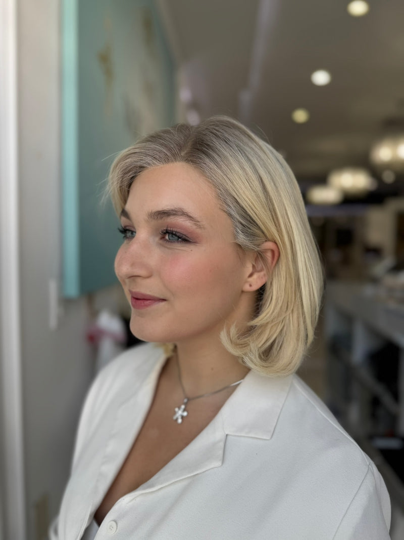 Back and side view of short blonde wig with natural hairline