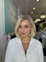 Woman in custom 100% European human hair wig styled in Beverly Hills.
