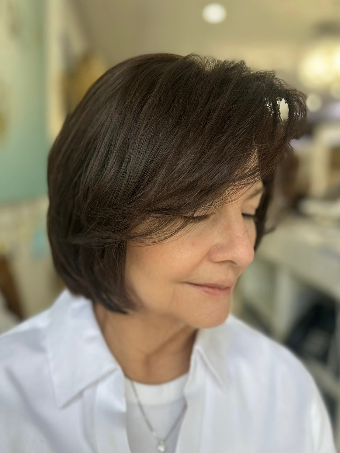  Sharon 12-inch lace wig in color #4/6, styled in a bob cut, offering a polished, natural look with pre-cut lace for easy wear.