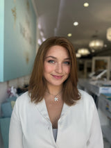 Model wearing Valentina 16-inch reddish brown lace front wig with natural part