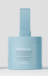 Wig Fairy Powder in a medium brown shade inside a sleek baby blue box, perfect for filling in bald spots and blending scalp color for a seamless look