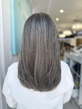 Back view of Zora lace wig with natural hair movement