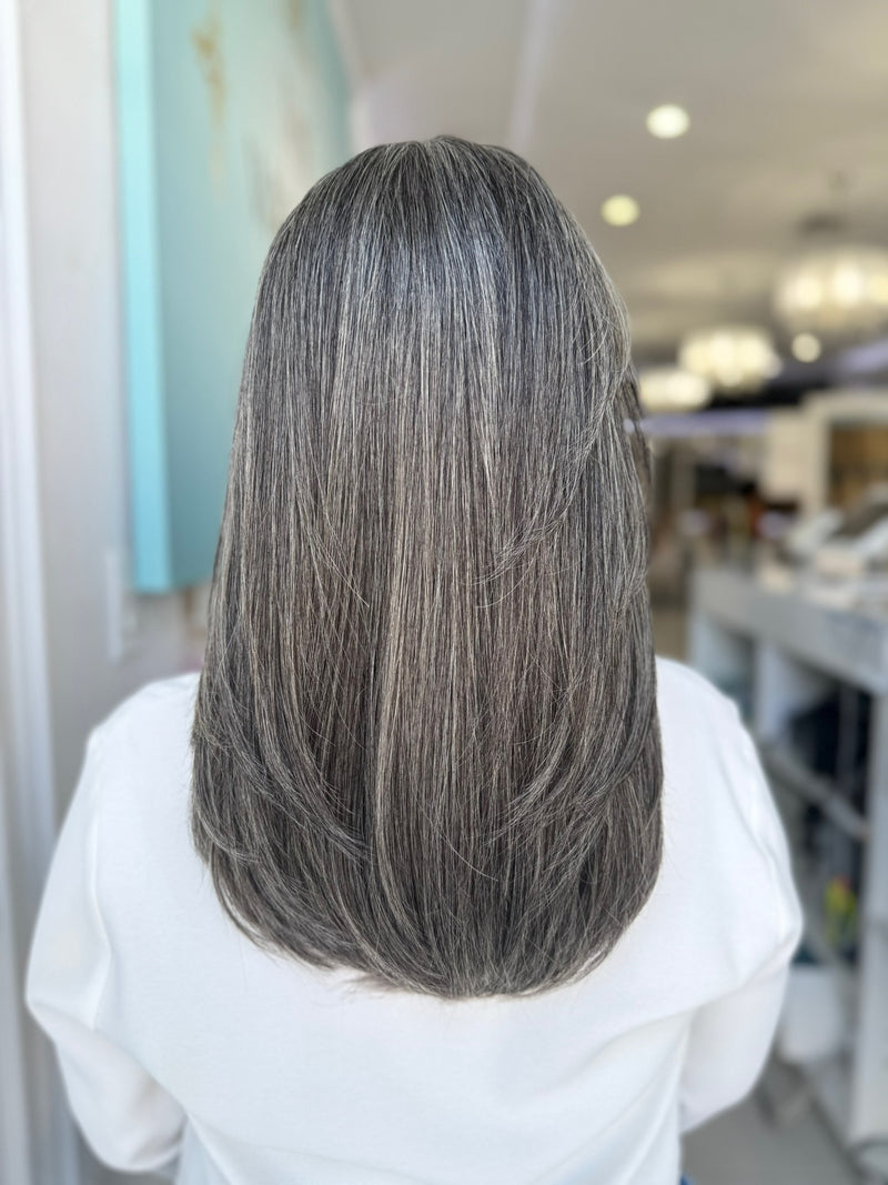 Back view of Zora lace wig with natural hair movement