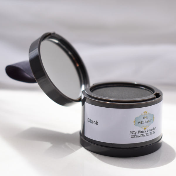 Open Wig Fairy Powder in Black packaging with sponge applicator for temporary wig coverage and scalp blending.