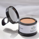 Open Wig Fairy Powder container in dark brown, showing the powder inside for natural scalp blending