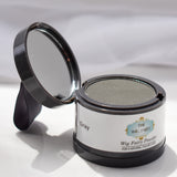 Gray Fusion Powder for wigs by The Wig Fairy, packaged in sleek black container with blue accents and white label.