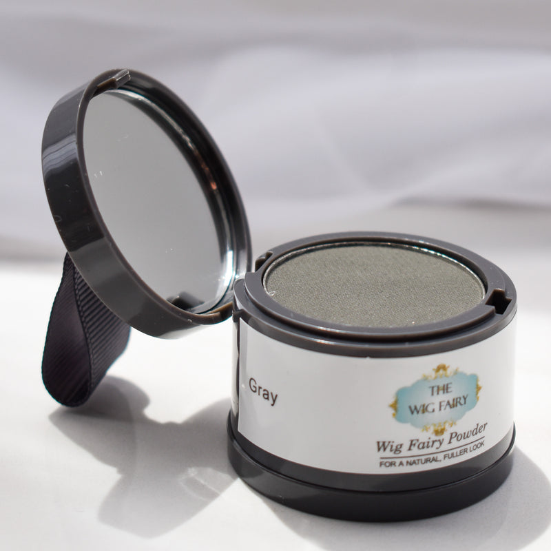 Gray Fusion Powder for wigs by The Wig Fairy, packaged in sleek black container with blue accents and white label.