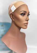 Side view of Mona-Mor Magic Cap in blonde velvet on mannequin, designed for secure and comfortable wig wear without combs or clips.