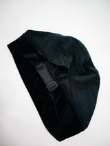 Adjustable Mona-Mor Magic Cap in dark brown, showing inner strap design and stretch velvet for a snug, comfortable fit.