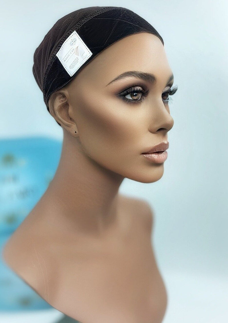 Side view of the Mona-Mor Magic Cap in dark brown velvet, shown on a mannequin for secure wig placement without clips or combs.