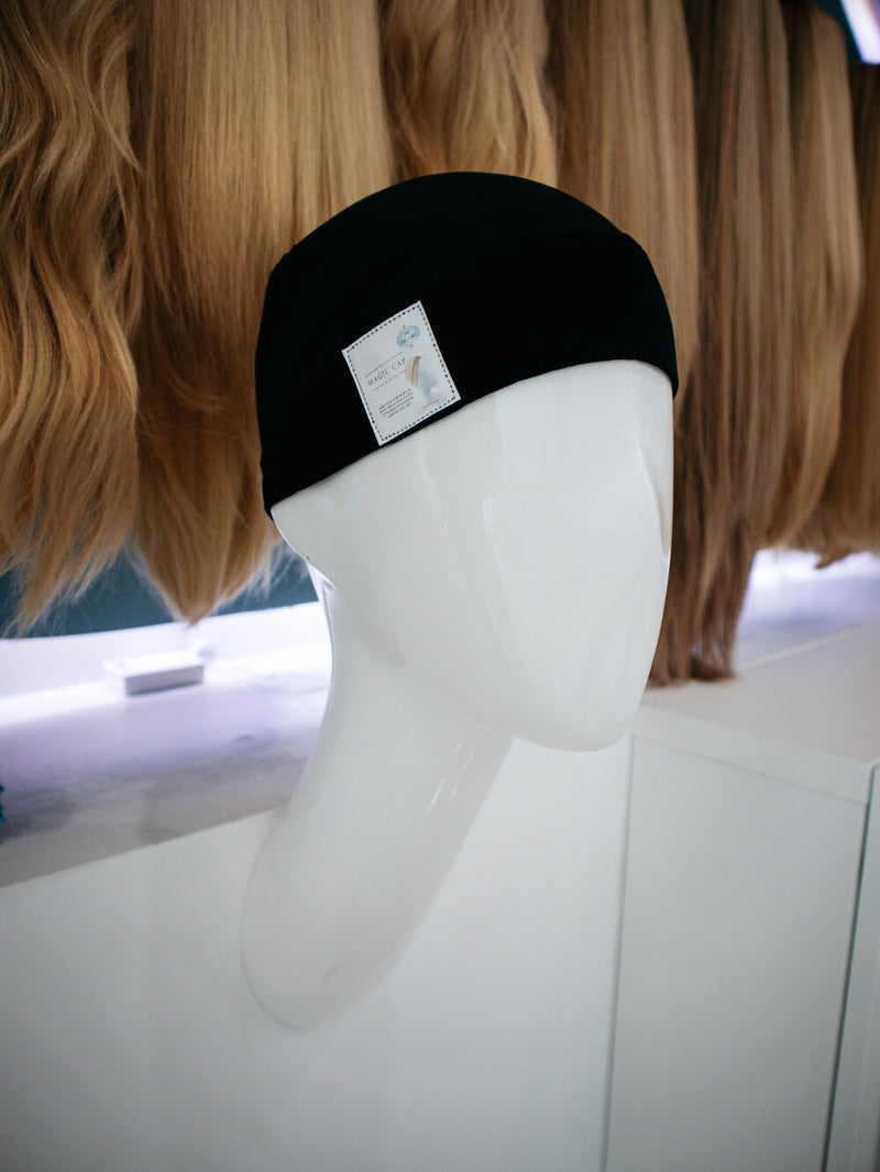 Close-up of the Mona-Mor Magic Cap in rich dark brown, featuring soft velvet material ideal for sensitive scalps or post-surgical wear.